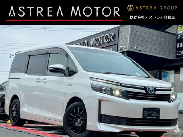 ヴォクシー(トヨタ) ハイブリッド X アルパイン9インチナビ フリップダウン TV 中古車画像