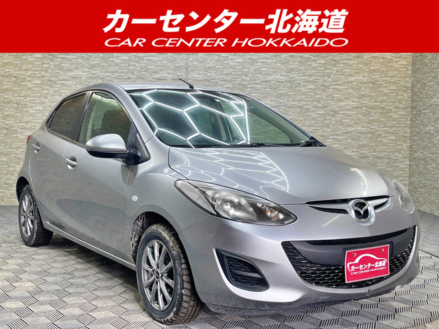 デミオ(マツダ) 1.3 13C 4WD　5年保証 ナビ 夏冬タイヤ 寒冷地仕様 中古車画像