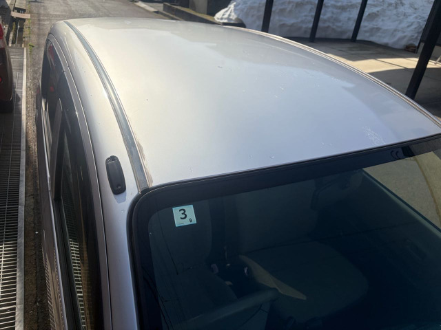 ��?����L