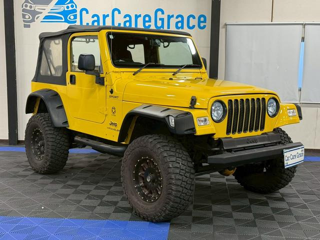 ラングラー（ジープ）スポーツ 4WD　4AT リフトアップ Aftermarketマフラー 中古車画像