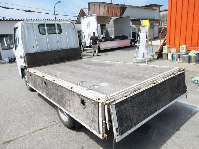 3���J