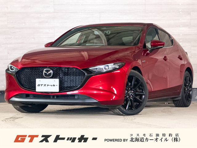 MAZDA3ファストバック（マツダ）2.0 X バーガンディ セレクション 4WD　6MT ワンオーナー ナビ ETC 中古車画像