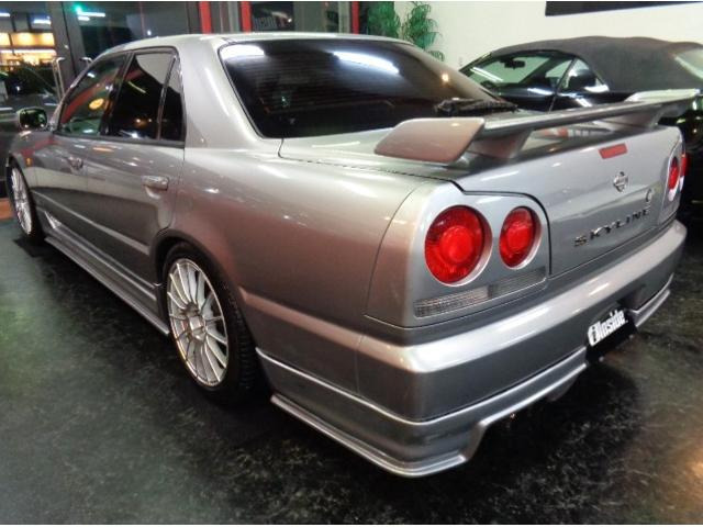 ソニックシルバーカラーR34GTRVスペックNISMO仕様フルエアロ4Dセダンボディ&トランクスポイラー&HIDライト&スモークウインカー他ドレスアップ仕様