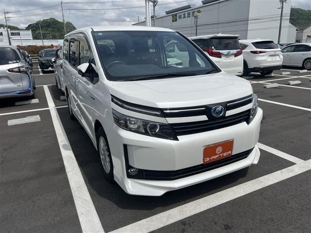 ヴォクシー(トヨタ) 1.8 ハイブリッド V　9型ナビ後席モニター両側電動7人乗LED 中古車画像