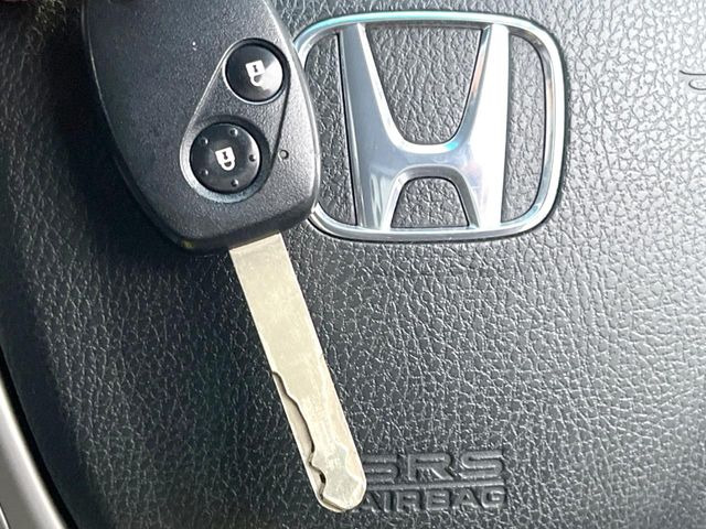 �yHonda�X�}�[�g�L�[�z�J�o����|�P�b�g�ɓ��ꂽ�܂܂ł��h�A�̎{���E�������\�ȃX�}�[�g�L�[�𑕔��B�G���W���̃I���E�I�t�����J�M�����o���K�v����������Ƃ��Ă��֗��ł���