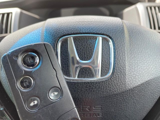 �yHonda�X�}�[�g�L�[�z�J�o����|�P�b�g�ɓ��ꂽ�܂܂ł��h�A�̎{���E�������\�ȃX�}�[�g�L�[�𑕔��B�G���W���̃I���E�I�t�����J�M�����o���K�v����������Ƃ��Ă��֗��ł���