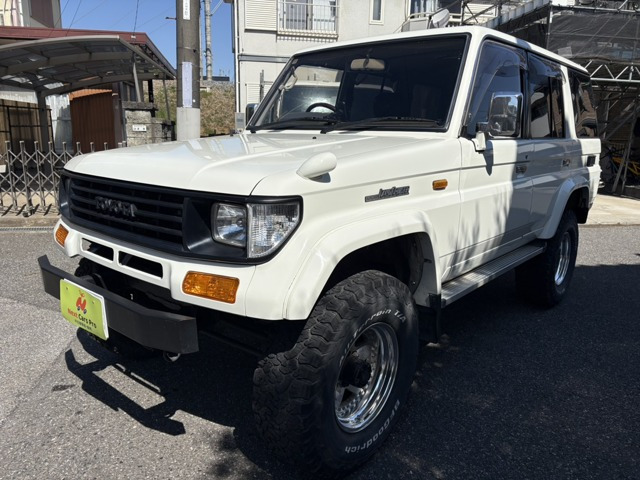 ランドクルーザープラド(トヨタ) 2.4 EXワイド ディーゼル 4WD　ナビ ETC 社外16インチアルミ 中古車画像