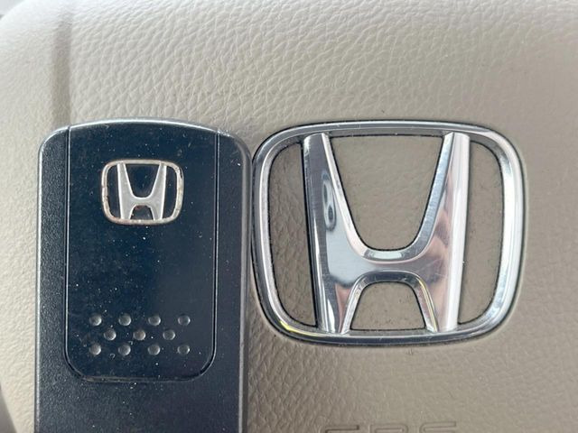 �yHonda�X�}�[�g�L�[�z�J�o����|�P�b�g�ɓ��ꂽ�܂܂ł��h�A�̎{���E�������\�ȃX�}�[�g�L�[�𑕔��B�G���W���̃I���E�I�t�����J�M�����o���K�v����������Ƃ��Ă��֗��ł���