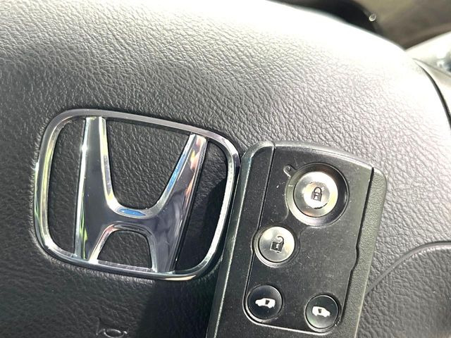 �yHonda�X�}�[�g�L�[�z�J�o����|�P�b�g�ɓ��ꂽ�܂܂ł��h�A�̎{���E�������\�ȃX�}�[�g�L�[�𑕔��B�G���W���̃I���E�I�t�����J�M�����o���K�v����������Ƃ��Ă��֗��ł���